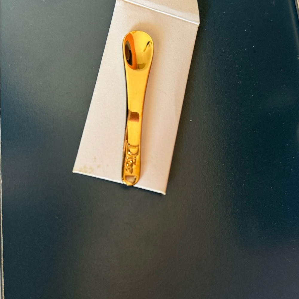 Christian Dior spoon applicator pendant